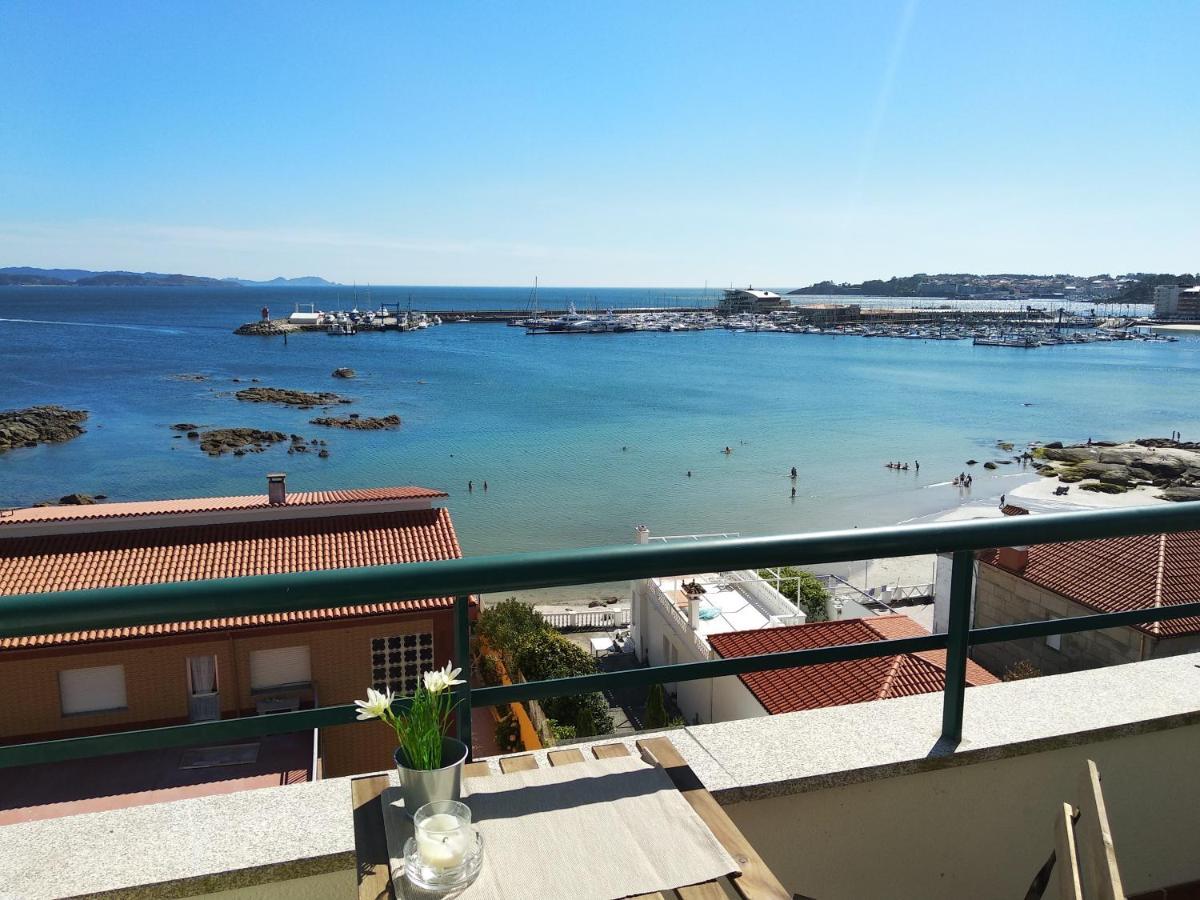 Apartamento Precioso ático con vistas a pie de playa Sanxenxo Exterior foto