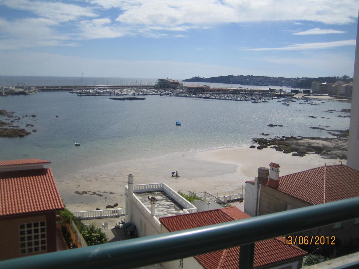 Apartamento Precioso ático con vistas a pie de playa Sanxenxo Exterior foto