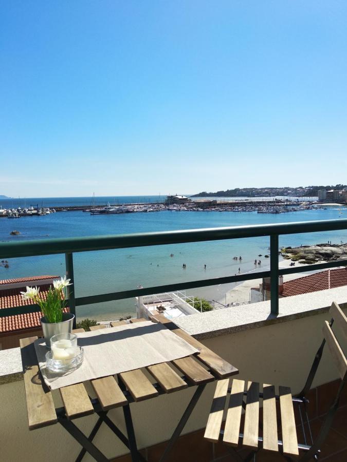 Apartamento Precioso ático con vistas a pie de playa Sanxenxo Exterior foto