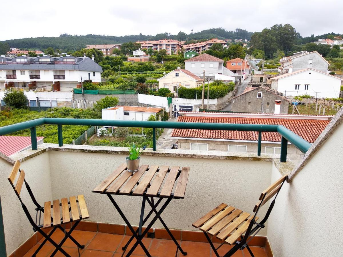 Apartamento Precioso ático con vistas a pie de playa Sanxenxo Exterior foto